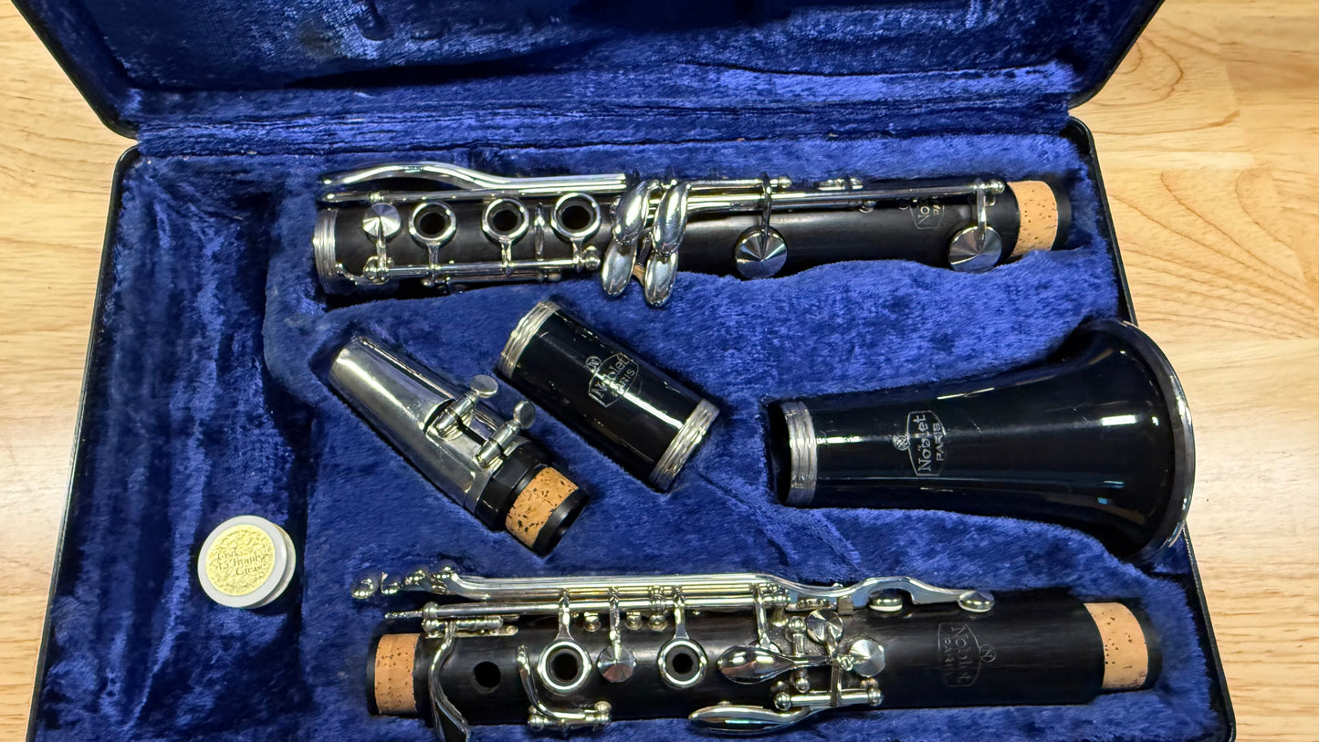     Noblet Paris wooden Bb clarinet displayed in blue lined case