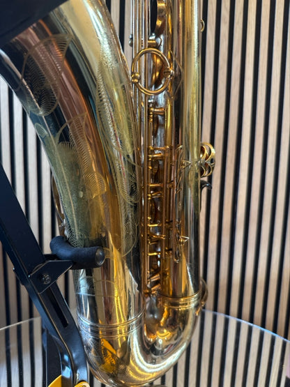 Close-up of the original gold lacquer, engraving and lower body mechanism of a 1968 Selmer Mark VI tenor saxophone