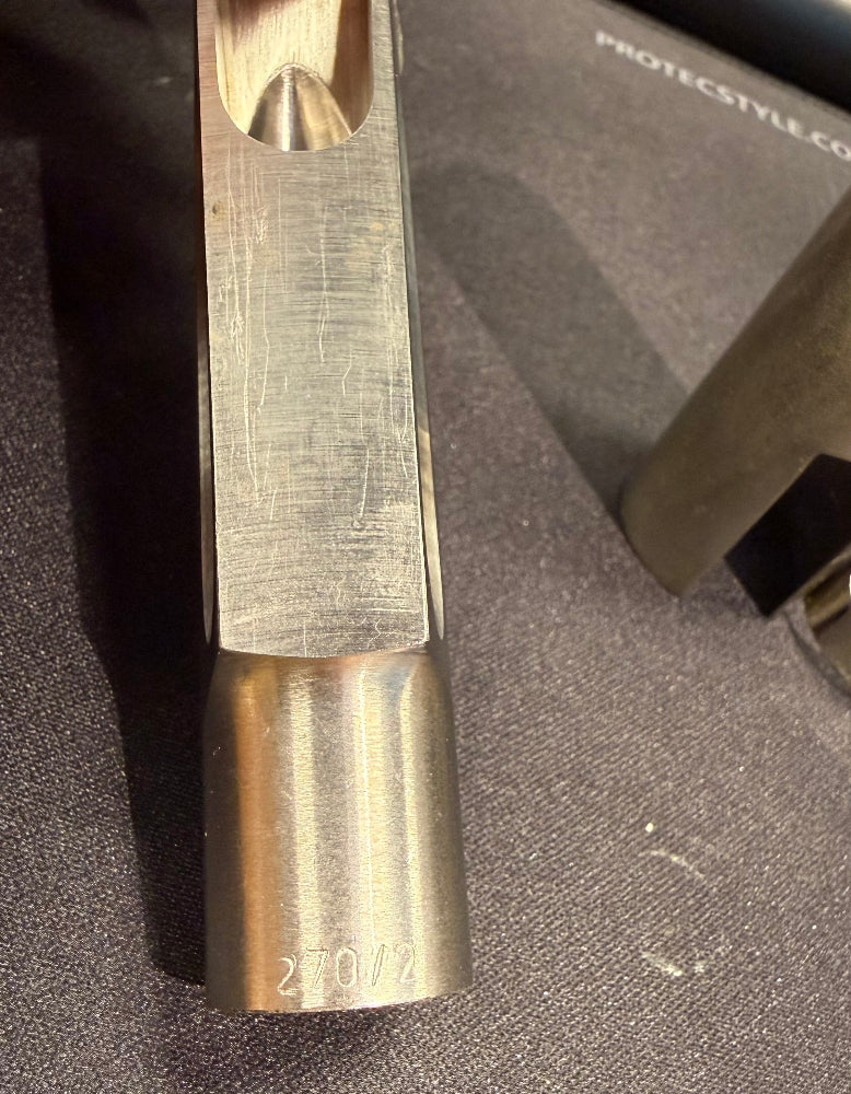 Close-up of the table and model marking on the Amati 270/2 tenor mouthpiece
