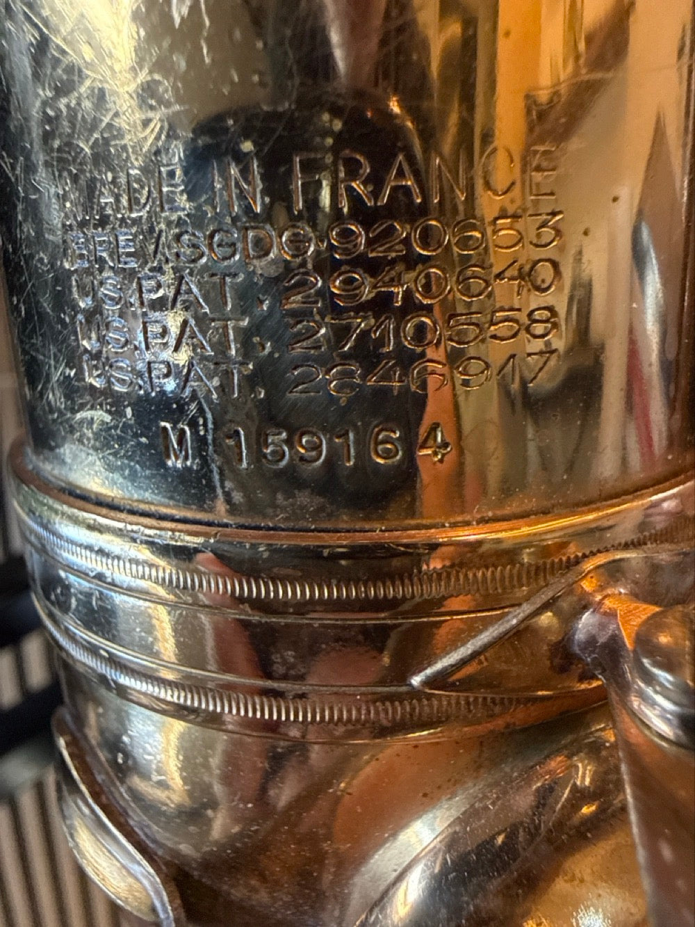 Close-up of the serial number 159164 and Made in France markings on a 1968 Selmer Mark VI tenor saxophone
