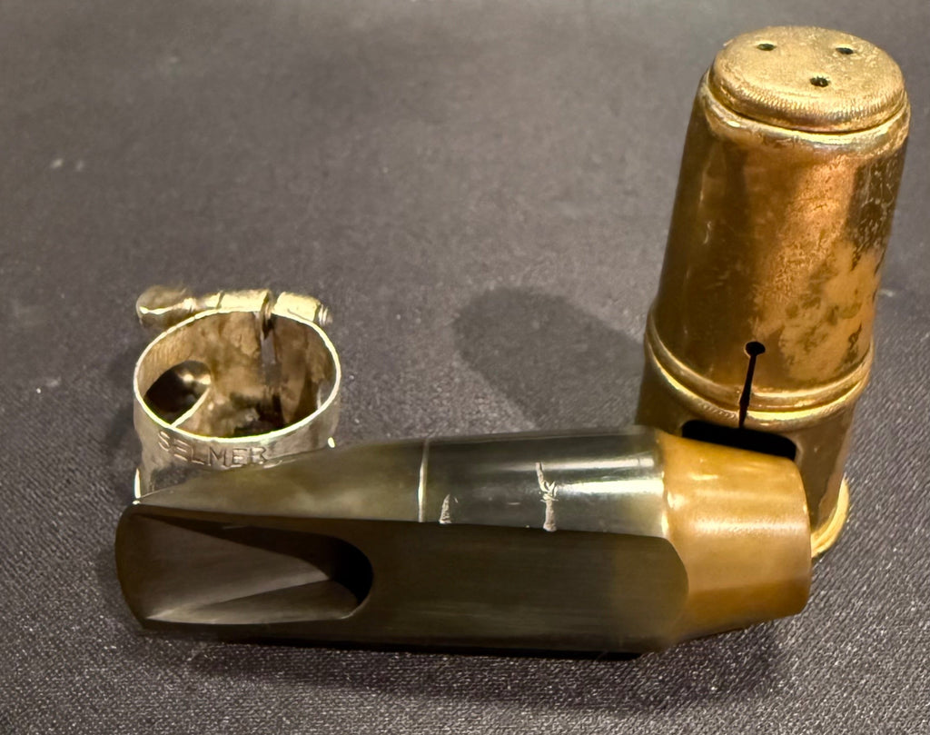 Side view of the Selmer S80 C-star mouthpiece showing its aged ebonite finish