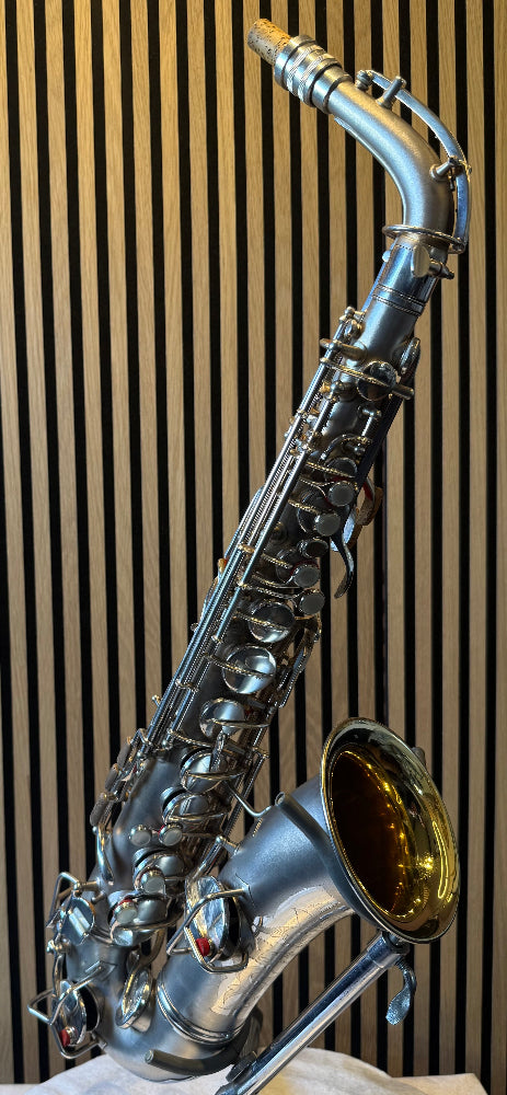 Conn saxophone keywork close-up with white leather pads