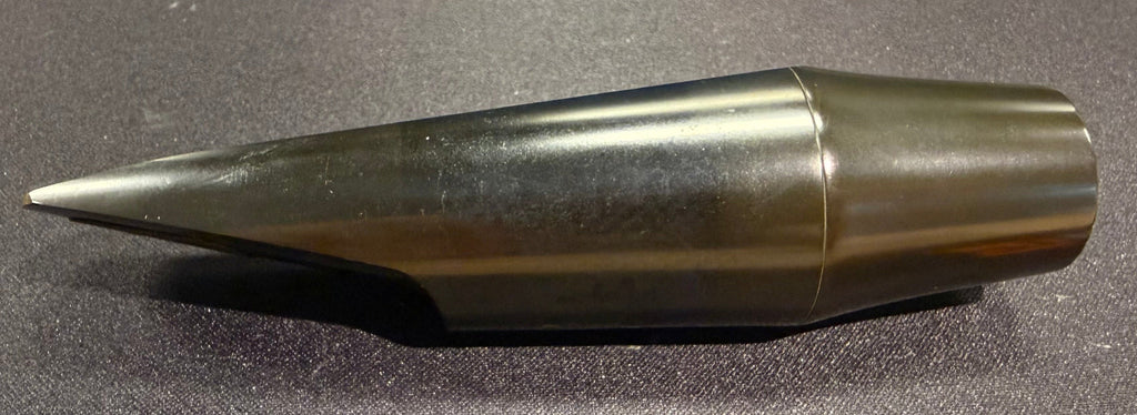 Side view of the used Vandoren B75 ebonite baritone saxophone mouthpiece