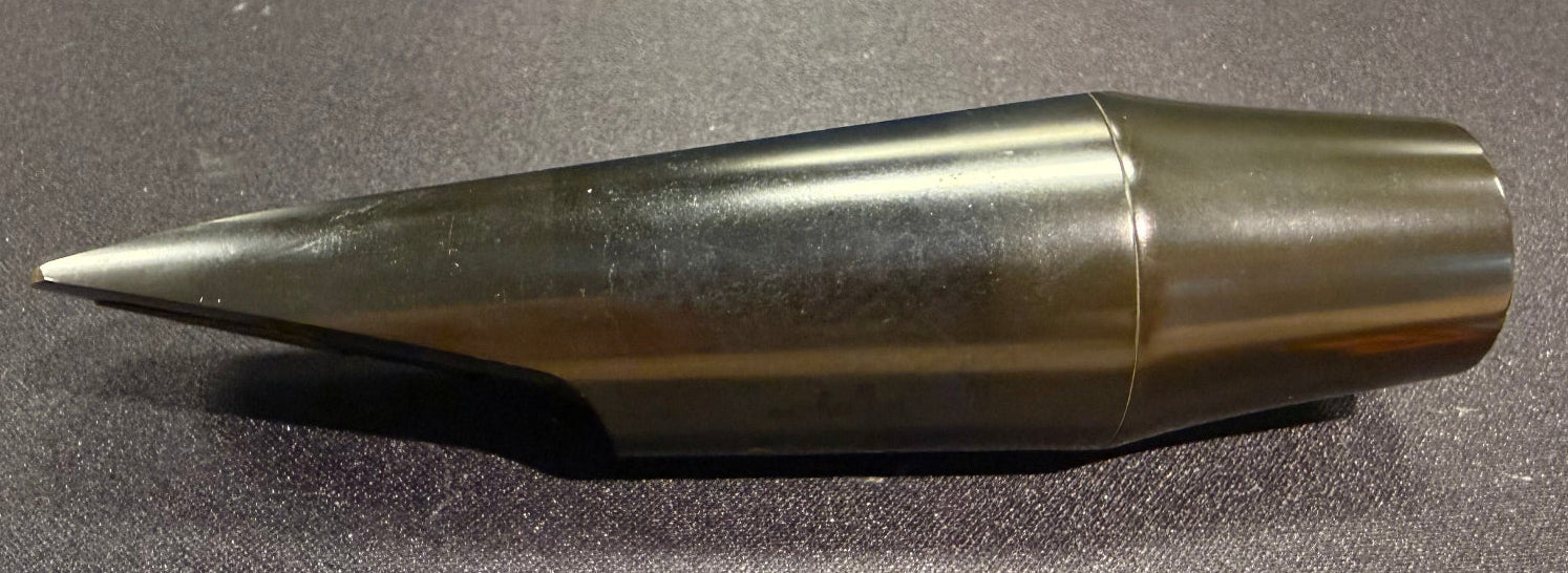 Side view of the used Vandoren B75 ebonite baritone saxophone mouthpiece