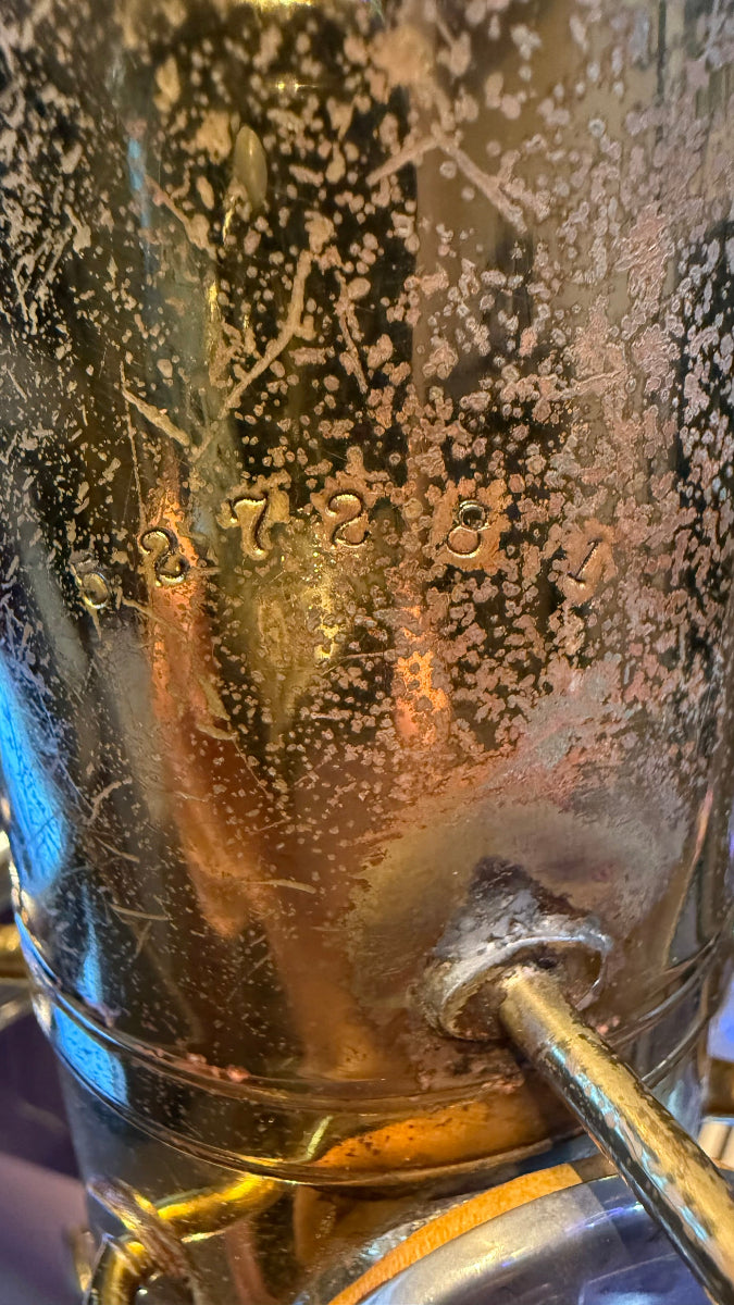 Close-up of the Selmer Bundy tenor saxophone serial number.
