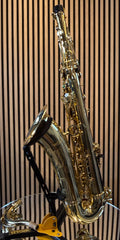 Selmer Super Action 80 Series II tenor saxophone in gold lacquer – full side view on display stand

