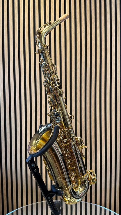 Trevor James SR alto saxophone in gold lacquer, side view on display stand