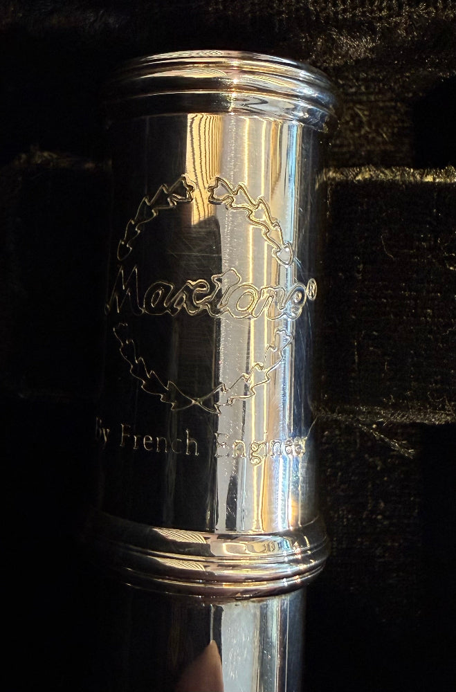 Maxtone flute logo engraving close-up