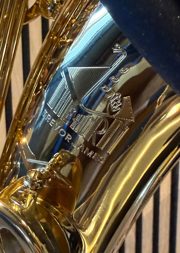 Trevor James The Horn alto saxophone in gold lacquer – close-up of The Horn by Trevor James bell engraving
