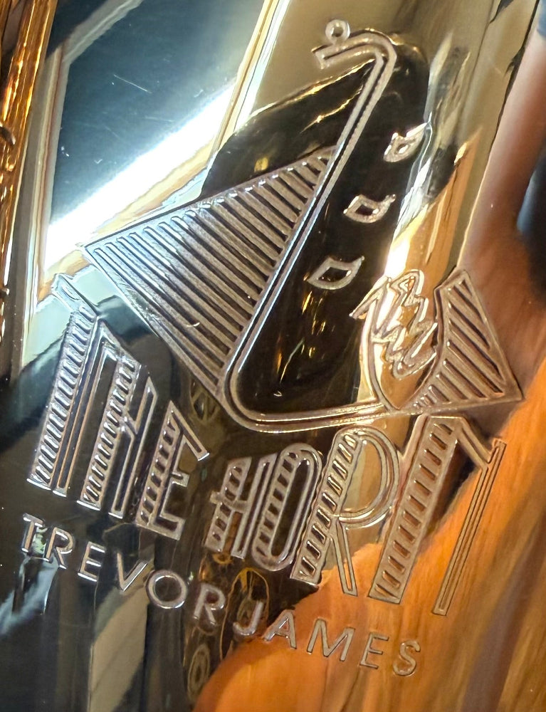 Trevor James The Horn tenor saxophone – close-up of The Horn by Trevor James logo engraving on the bell
