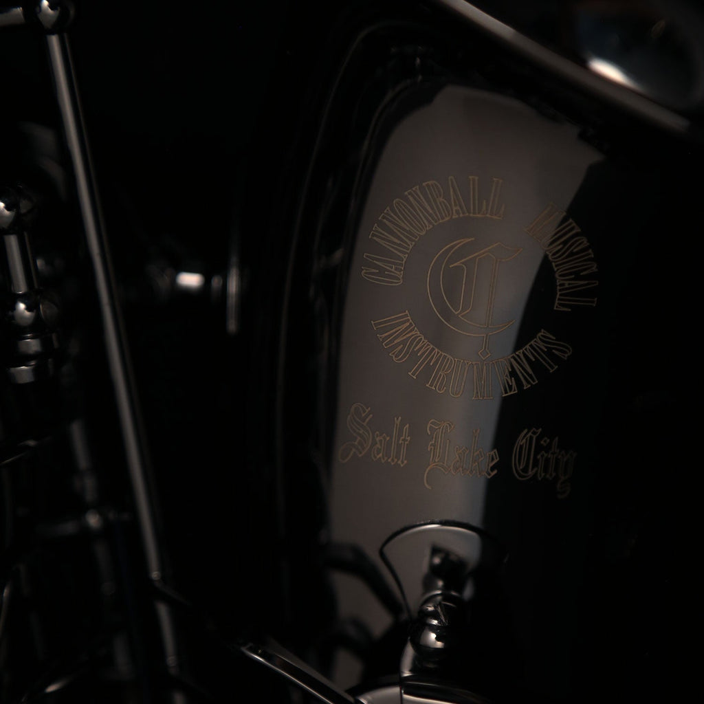 Close-up of Cannonball A4-B black nickel alto saxophone bell and engraving