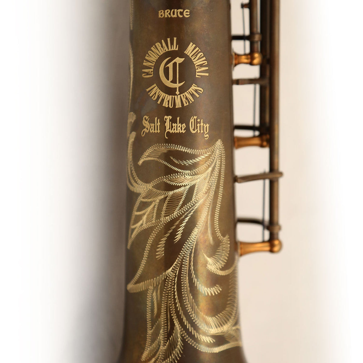 Example of The Brute aged brass body engraving on a Cannonball soprano saxophone